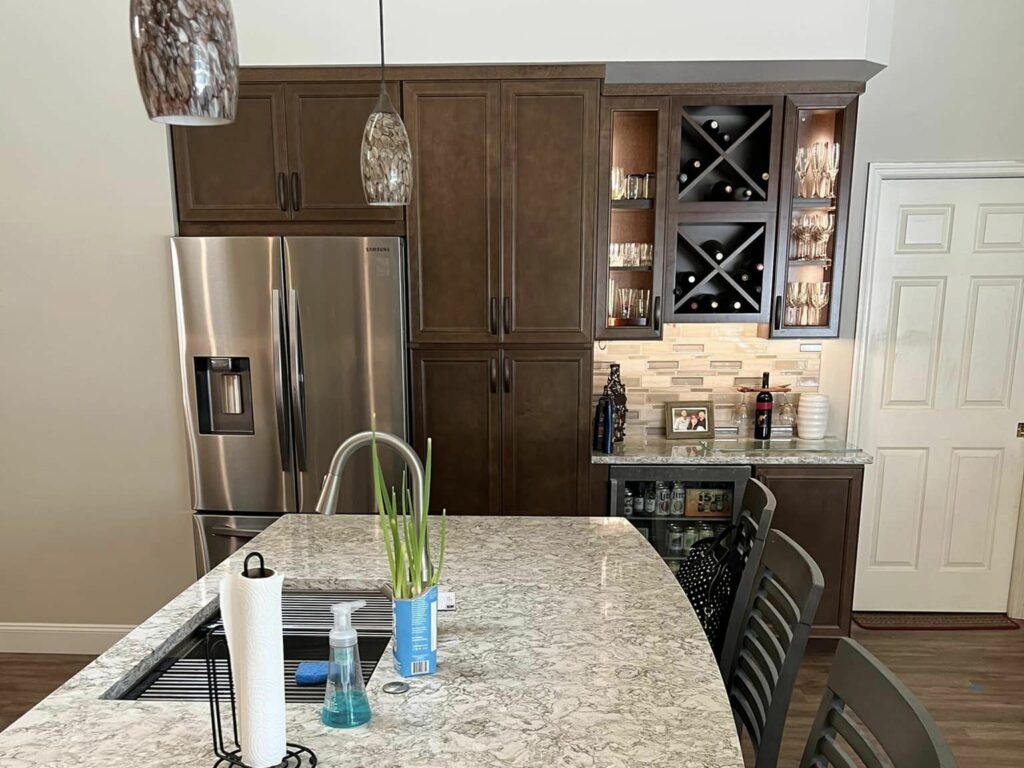 classic kitchen renovation clearwater florida with walnut cabinets, sink-view