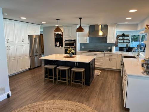 off white cabinets in bohemian style kitchen